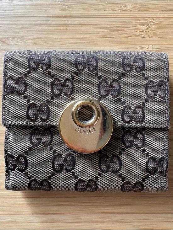 Gucci Handbags - Gucci Brown GG Canvas Snap Wallet with Gold-Tone Accent
